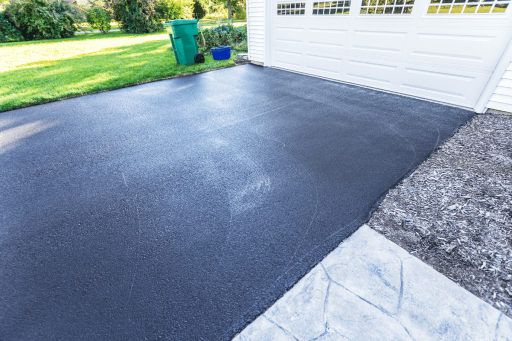 Xpress Construction & Services shows a finished driveway and well-kept yard, highlighting their quality home improvement work.
